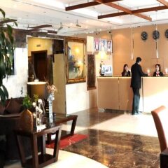 Legacy Hotel Apartments интерьер отеля