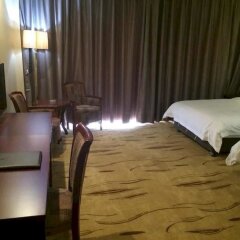 Shengshi Holiday Hotel комната для гостей фото 3