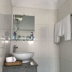 Отель Uptown Hoi An Hotel Вьетнам, Хойан - отзывы, цены и фото номеров - забронировать отель Uptown Hoi An Hotel онлайн ванная