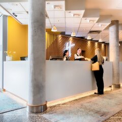 Отель Holiday Inn München Süd Германия, Мюнхен - 13 отзывов об отеле, цены и фото номеров - забронировать отель Holiday Inn München Süd онлайн интерьер отеля фото 3