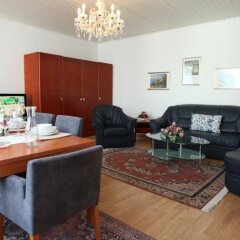 Апартаменты Mozart Apartments Вена комната для гостей фото 2