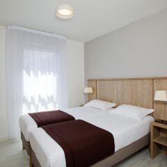 Отель Séjours & Affaires Park Avenue Франция, Лион - отзывы, цены и фото номеров - забронировать отель Séjours & Affaires Park Avenue онлайн комната для гостей фото 4