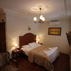 Апартаменты Tashkonak Sultan Suites and Apartments комната для гостей фото 4