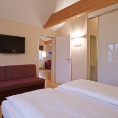 Holiday Apartments by Das Grüne Hotel zur Post - 100 % BIO & Villa Ceconi Зальцбург комната для гостей фото 4