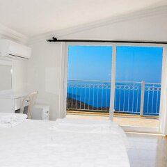 Villa MNM Турция, Калкан - отзывы, цены и фото номеров - забронировать отель Villa MNM онлайн комната для гостей фото 5