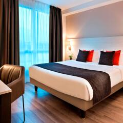 Citadines Apart`Hotel Montmartre Париж комната для гостей