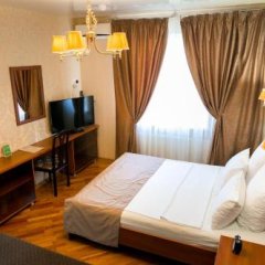 Гостиница Фидель в Краснодаре 10 отзывов об отеле, цены и фото номеров - забронировать гостиницу Фидель онлайн Краснодар комната для гостей фото 5