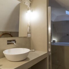 Отель Fra I Sassi - Residence Матера ванная