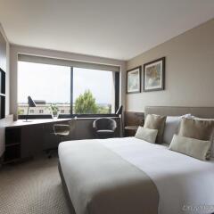 Отель Crowne Plaza Geneva Швейцария, Женева - отзывы, цены и фото номеров - забронировать отель Crowne Plaza Geneva онлайн комната для гостей фото 3