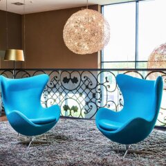 Отель Motel One Wien-Westbahnhof Вена интерьер отеля