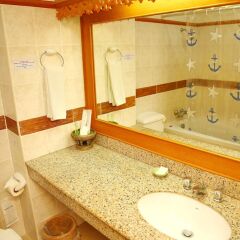 Отель Diana Garden Resort & Lodge ванная фото 2