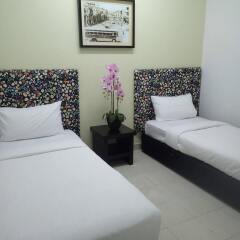 Отель Ar-Raudhah Suites and Hotel Малайзия, Пенанг - отзывы, цены и фото номеров - забронировать отель Ar-Raudhah Suites and Hotel онлайн комната для гостей фото 3