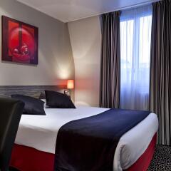 Отель Timhotel Odessa Montparnasse Париж комната для гостей