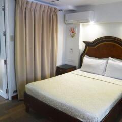 Отель 1775 Adriatico Suites Филиппины, Манила - отзывы, цены и фото номеров - забронировать отель 1775 Adriatico Suites онлайн комната для гостей фото 4
