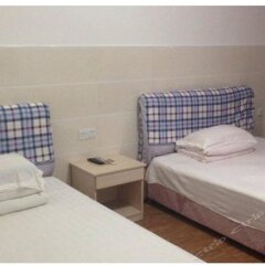 Xinglong Hotel комната для гостей