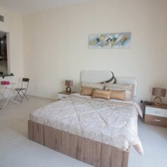 Отель One Perfect Stay - Discovery Gardens комната для гостей фото 3
