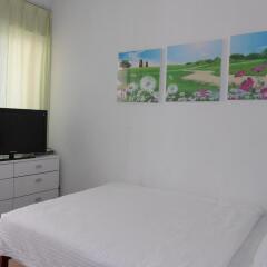 Апартаменты Green Garden Apartment-shenzhen комната для гостей фото 5