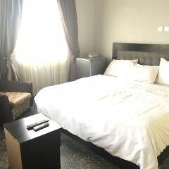 Отель Pentagon Luxury Suites Enugu Нигерия, Энугу - отзывы, цены и фото номеров - забронировать отель Pentagon Luxury Suites Enugu онлайн комната для гостей