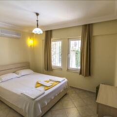 Villa Kilic by Villamnet Турция, Мугла - отзывы, цены и фото номеров - забронировать отель Villa Kilic by Villamnet онлайн комната для гостей фото 2