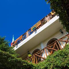 Отель Hostel Cancun Natura Мексика, Канкун - отзывы, цены и фото номеров - забронировать отель Hostel Cancun Natura онлайн вид на фасад