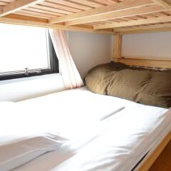 Отель Guest House Hokorobi Фукуока комната для гостей