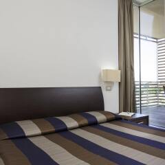 Отель Residence Delfina Италия, Римини - отзывы, цены и фото номеров - забронировать отель Residence Delfina онлайн комната для гостей фото 3