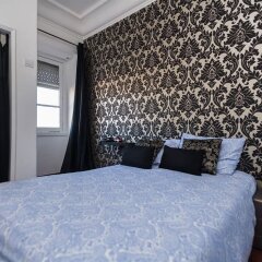 Отель V Dinastia Lisbon Guesthouse Португалия, Лиссабон - 1 отзыв об отеле, цены и фото номеров - забронировать отель V Dinastia Lisbon Guesthouse онлайн комната для гостей фото 3