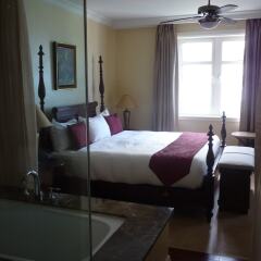 Отель Palmyra Luxury Beach Condo комната для гостей