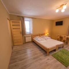 Отель Pokoje i Apartamenty Nad Potokiem Закопане комната для гостей фото 5