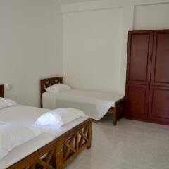 Отель Di Sicuro Tourist Inn Хиккадува комната для гостей фото 3