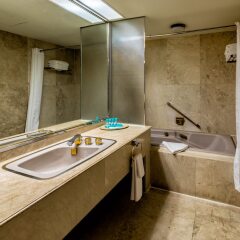 Отель Pacific Star Resort And Spa Тамунинг ванная