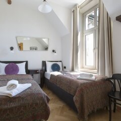 Отель Antique Apartments - Plac Szczepanski Польша, Краков - 1 отзыв об отеле, цены и фото номеров - забронировать отель Antique Apartments - Plac Szczepanski онлайн комната для гостей
