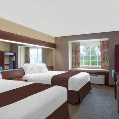 Отель Microtel Inn & Suites by Wyndham Meridian комната для гостей