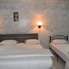 Апартаменты Galaxy Hotels & Apartments комната для гостей фото 3
