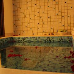 Отель DoubleTree by Hilton Resort & Spa Marjan Island ванная фото 3
