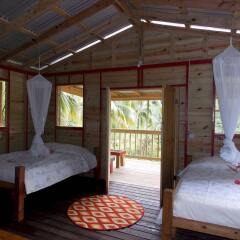 Roots Jungle Retreat in Massacre, Dominica from 63$, photos, reviews - zenhotels.com guestroom