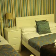 Отель Cross Street Guesthouse комната для гостей фото 5