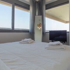 Отель Stylish 2 Bedroom Apartment Spectacular Sea View Греция, Вари-Вула-Вулиагмени - отзывы, цены и фото номеров - забронировать отель Stylish 2 Bedroom Apartment Spectacular Sea View онлайн комната для гостей фото 4