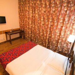 Отель Tagaitai Guest House Кыргызстан, Каракол - отзывы, цены и фото номеров - забронировать отель Tagaitai Guest House онлайн удобства в номере фото 2
