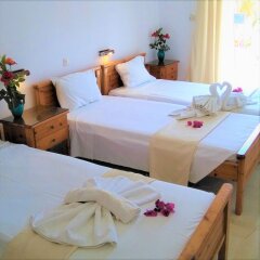 Отель Avra Sea View Paradise Pool Aparthotel Греция, Сивота - отзывы, цены и фото номеров - забронировать отель Avra Sea View Paradise Pool Aparthotel онлайн комната для гостей