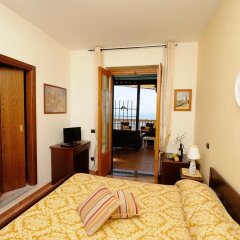 Отель Holiday House Le Palme Италия, Амальфи - отзывы, цены и фото номеров - забронировать отель Holiday House Le Palme онлайн удобства в номере