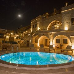Kayakapi Premium Caves Cappadocia Турция, Ургуп - 1 отзыв об отеле, цены и фото номеров - забронировать отель Kayakapi Premium Caves Cappadocia онлайн бассейн фото 2