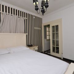 Отель Little White House Xiamen Gulangyu Китай, Сямынь - отзывы, цены и фото номеров - забронировать отель Little White House Xiamen Gulangyu онлайн комната для гостей фото 4