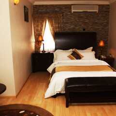 Отель Cotton Suites сейф в номере