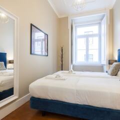 Апартаменты Baixa Vintage Three-Bedroom Apartment - by LU Holidays Лиссабон комната для гостей фото 2