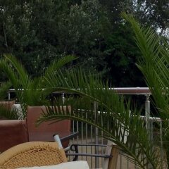 TM Deluxe Hotel балкон