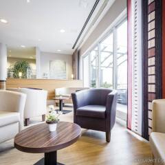 Отель Holiday Inn Express Cologne Mulheim Кёльн комната для гостей