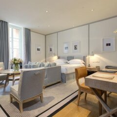 Отель Portrait Suites комната для гостей фото 3
