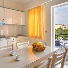 Апартаменты Athena Apartments в номере
