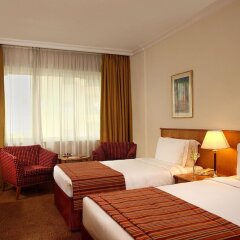 Отель Swiss-Belhotel Sharjah комната для гостей фото 6